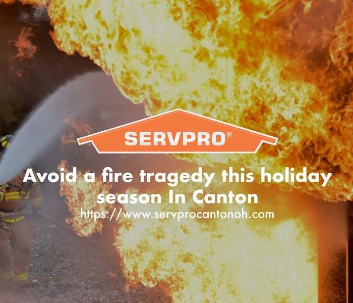 Orange SERVPRO  house logo on fire image with firefighters 