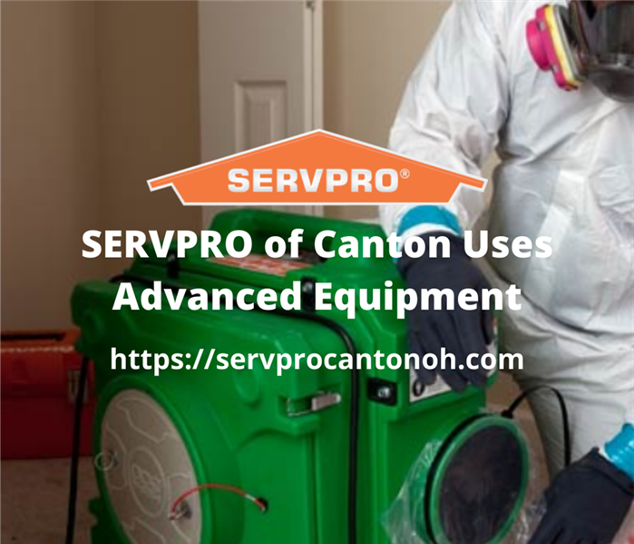 SERVPRO technician working with equipment to dry a property
