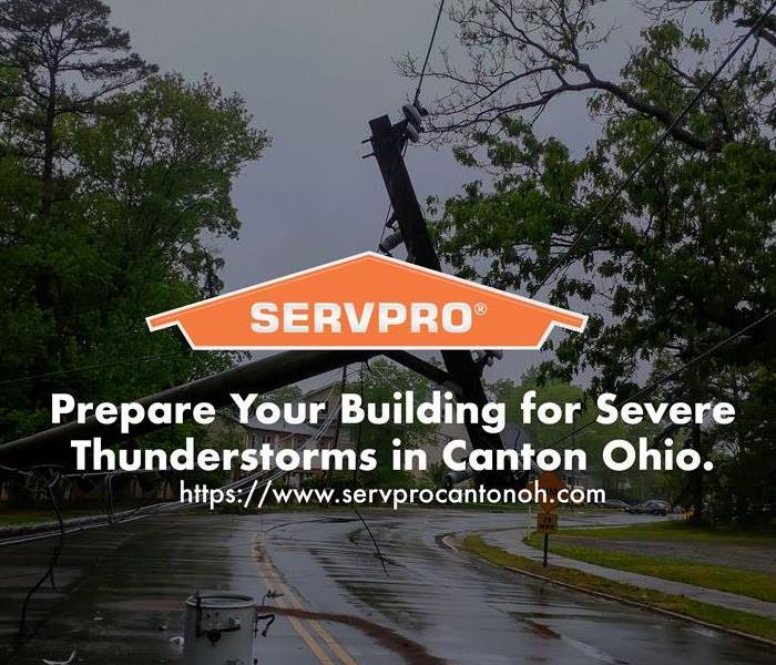 Orange SERVPRO  house logo on image with trees and storm damage 